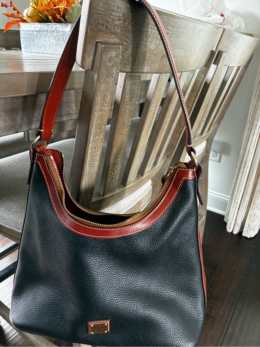 Dooney & Bourke Black Pebbled Leather Shoulder Bag with Brown Trim